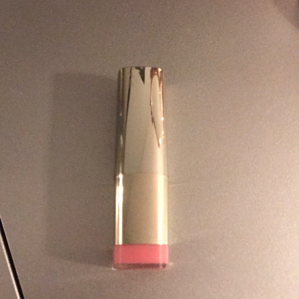 Medium light pink lipstick never used
